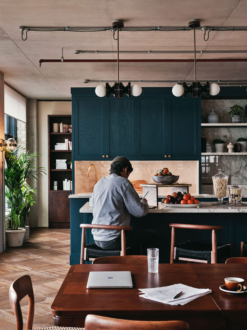 Man sitting working in the pantry area