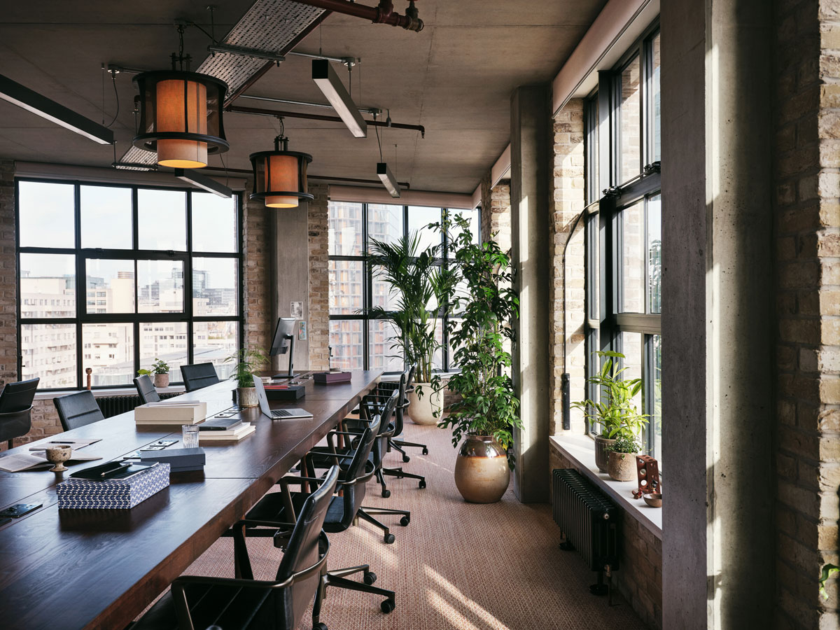 Full length windows in corner private office