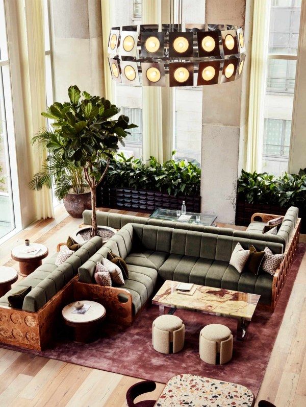 Corner with a sofa and a pendant light in Working From_ Brussels
