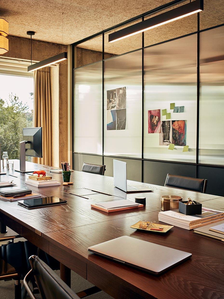 Comfortable office space with wall art and soft seats